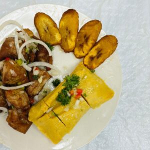 Tamal Con Masa De Puerco Frito / Tamale With Fried Pork Chunks