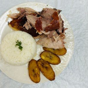 Paleta De Cerdo Asada Con Acompañante / Grilled Pork Shoulder With Side